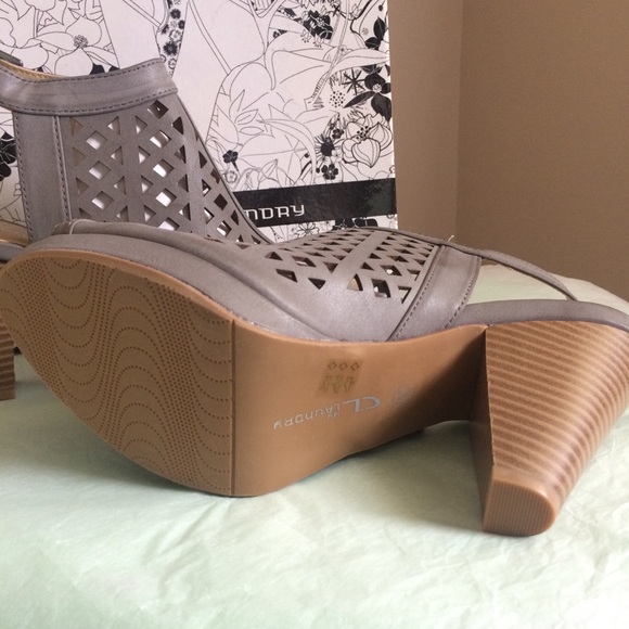 cl by laundry spot on sandal